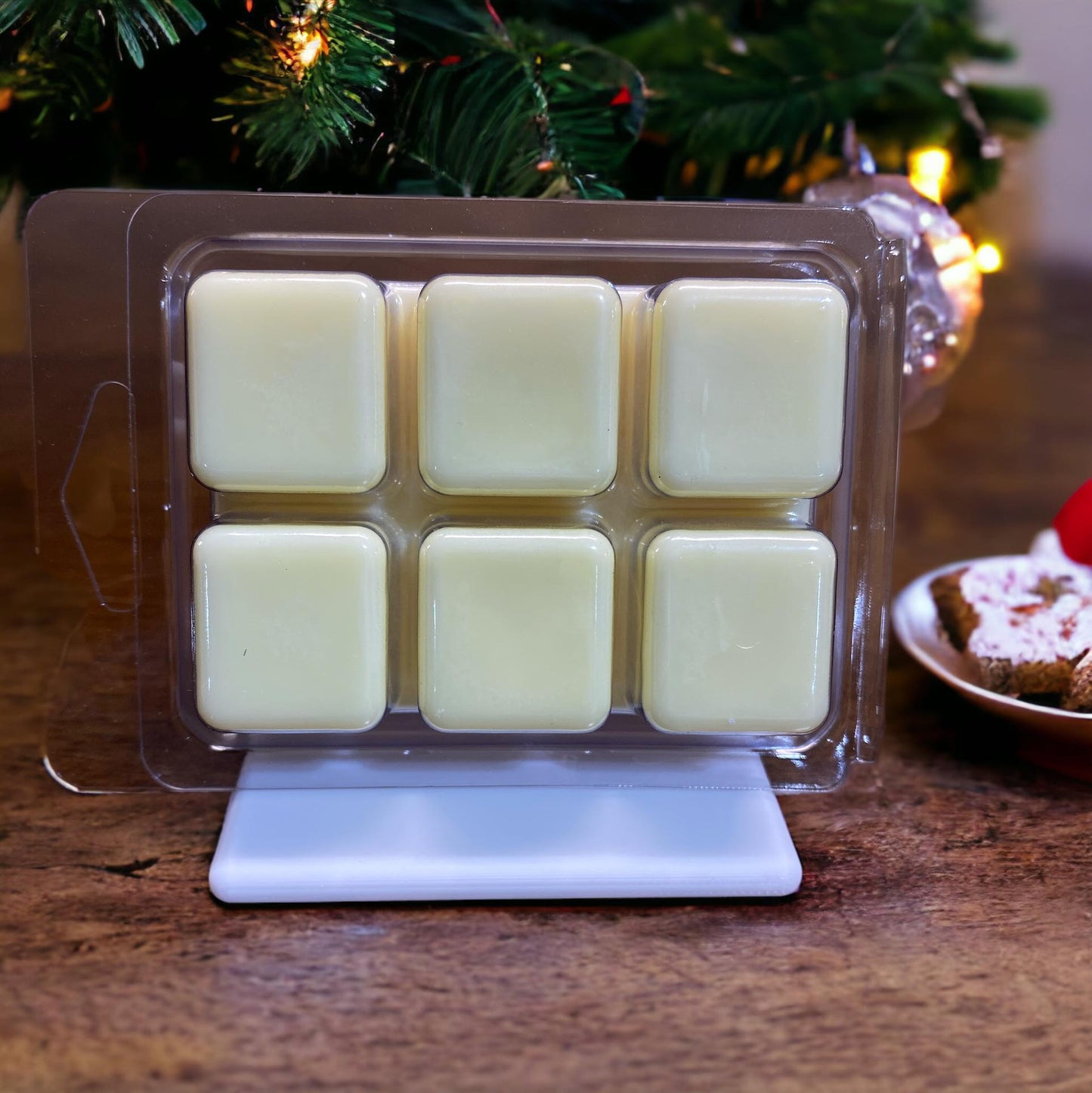 Our Christmas Cookies Wax Melts are more than a scent; they're a journey into the heart of holiday baking magic. Let the sweet notes of sugar crystals, bakery delights, vanilla, and butter fill your space with the warmth and joy of festive treats. It's the perfect way to infuse your home with the comforting aroma of Christmas cheer.