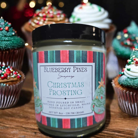 Christmas Frosting invites you into a cozy holiday kitchen filled with the rich, creamy warmth of vanilla buttercream. Notes of sweet vanilla bean mingle with a touch of sugar, evoking freshly whipped frosting and the comforting aroma of holiday treats baking in the oven. Scented Soy Candle. 8oz